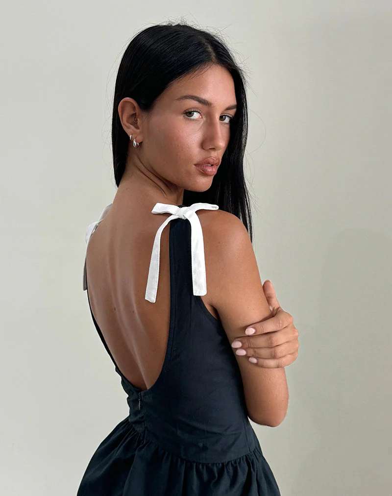 Taleshi Minikleid in Schwarz mit Steppschuhen mit weißen Schleifen - Image 3