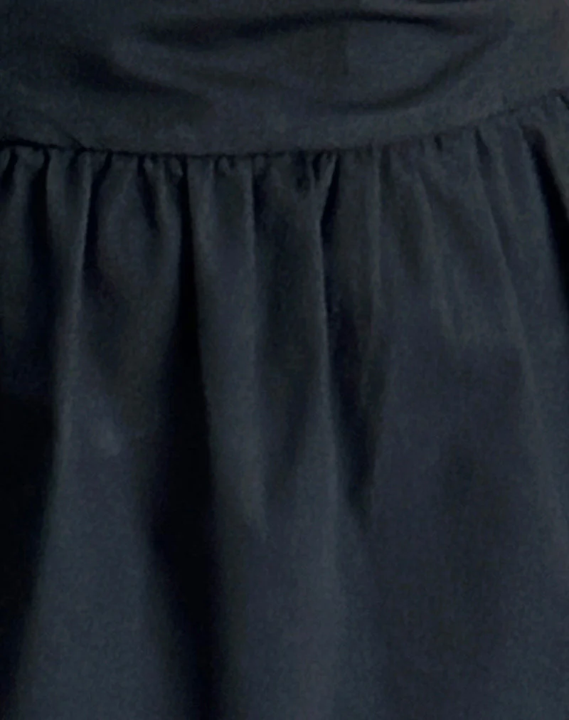 Taleshi Minikleid in Schwarz mit Steppschuhen mit weißen Schleifen - Image 6